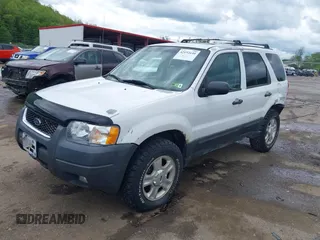 2003 Ford Escape XLT Popular 2 with VIN 1FMYU93193KC06499, listed as a IAAI auction lot 42192640 with 180,095 mi miles and . Bid and sale history available at DreamBid. Image 2.