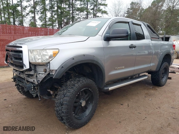 2012 Toyota Tundra 2WD Truck with VIN 5TFRM5F14CX038187, listed as a IAAI auction lot 41521633 with 187,039 mi miles. Bid and sale history available at carsss.com. Image 19.