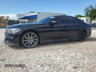 2019 BMW 5 Series M550i xDrive with VIN WBAJB9C51KB288125, listed as a Copart auction lot 61418435 with 70,402 mi miles and Salvage title. Bid and sale history available at DreamBid. Image 1.