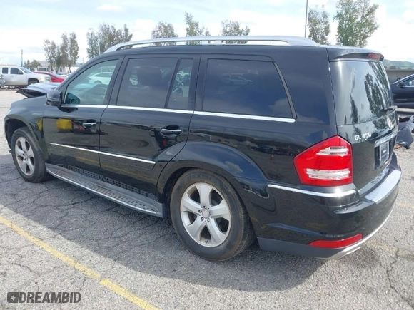 2012 Mercedes-Benz GL-Class GL 450 with VIN 4JGBF7BE6CA785983, listed as a IAAI auction lot 41870613 with 75,004 mi miles. Bid and sale history available at carsss.com. Image 3.