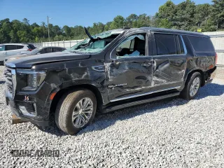 2023 GMC Yukon XL SLT with VIN 1GKS2GKDXPR254627, listed as a Copart auction lot 59226594 with 39,428 mi miles and Salvage Title. Bid and sale history available at carsss.com. Image 1.