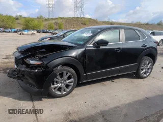2021 Mazda CX-30 Select z VIN 3MVDMBBL4MM317712, wystawiony jako Copart lot #56322775 z przebiegiem 31 962 mil mil oraz Szkoda całkowita • Salvage title. Historia ofert i sprzedaży dostępna na DreamBid. Obrazek 1.