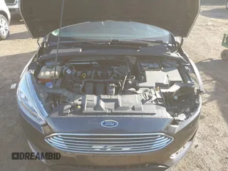 2016 Ford Focus SE with VIN 1FADP3F2XGL207906, listed as a IAAI auction lot 42099203 with 95,527 mi miles. Bid and sale history available at carsss.com. Image 10.