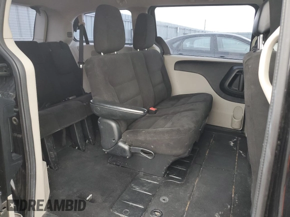 2015 Dodge Grand Caravan SE with VIN 2C4RDGBGXFR744203, listed as a Copart auction lot 54791795 with 216,594 mi miles and Clean Title. Bid and sale history available at DreamBid. Image 11.
