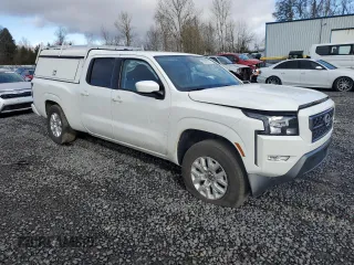 2024 Nissan Frontier SV with VIN 1N6ED1FJXRN637443, listed as a Copart auction lot 49068835 with 6,600 mi miles and Salvage title. Bid and sale history available at DreamBid. Image 4.