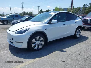 2023 Tesla Model Y Long Range with VIN 7SAYGAEE5PF855834, listed as a IAAI auction lot 41943491 with 34,480 mi miles. Bid and sale history available at carsss.com. Image 25.
