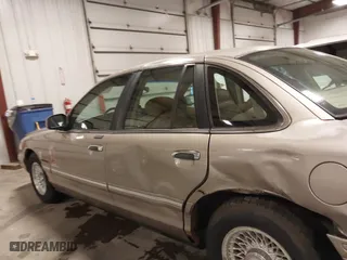 1995 Ford Crown Victoria LX with VIN 2FALP74W0SX195270, listed as a IAAI auction lot 41840082 with 139,967 mi miles. Bid and sale history available at carsss.com. Image 15.
