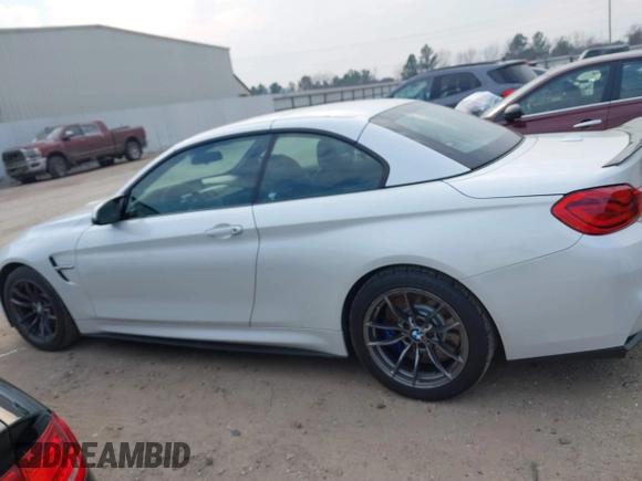 2018 BMW M4 with VIN WBS4Z9C55JED30963, listed as a IAAI auction lot 41641751 with 34,543 mi miles and . Bid and sale history available at DreamBid. Image 14.