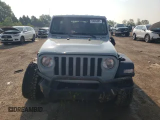 2023 Jeep Wrangler Willys with VIN 1C4HJXDG9PW615072, listed as a Copart auction lot 59606805 with 72,969 mi miles and Salvage title. Bid and sale history available at DreamBid. Image 5.