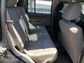 2009 Jeep Commander Sport z VIN 1J8HG48K99C551852, wystawiony jako Copart lot #55077775 z przebiegiem 157 829 mil mil oraz Szkoda całkowita • Salvage title. Historia ofert i sprzedaży dostępna na DreamBid. Obrazek 11.