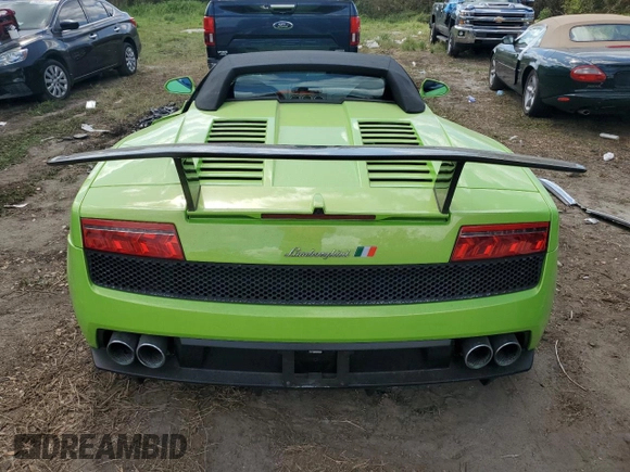 2013 Lamborghini Gallardo z VIN ZHWGU6BZ9DLA12793, wystawiony jako Copart lot #77525804 z przebiegiem 11 777 mil mil oraz Szkody całkowita. Historia ofert i sprzedaży dostępna na DreamBid. Obrazek 6.