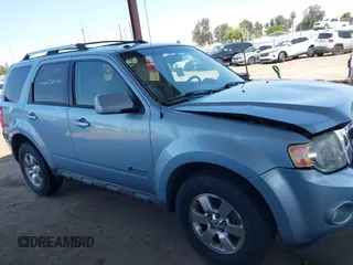 2009 Ford Escape Hybrid z VIN 1FMCU49359KA28475, wystawiony jako IAAI lot #42153444 z przebiegiem 210 067 mil mil oraz . Historia ofert i sprzedaży dostępna na DreamBid. Obrazek 13.