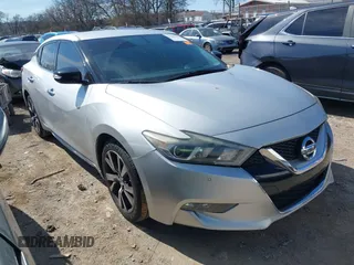 2016 Nissan Maxima Platinum with VIN 1N4AA6AP1GC400986, listed as a IAAI auction lot 41603612 with 171,784 mi miles and . Bid and sale history available at DreamBid. Image 1.