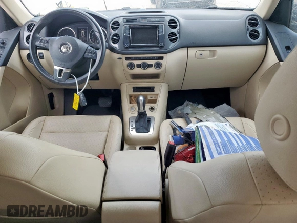 2017 Volkswagen Tiguan S with VIN WVGAV7AX4HW509023, listed as a Copart auction lot 63181405 with 114,006 mi miles and Salvage title. Bid and sale history available at DreamBid. Image 8.