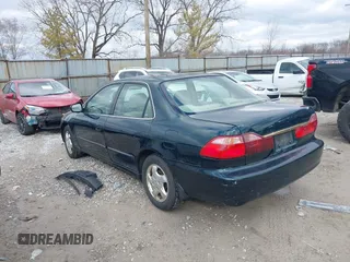 2000 Honda Accord EX z VIN JHMCG5659YC001925, wystawiony jako IAAI lot #41715654 z przebiegiem 190 605 mil mil oraz . Historia ofert i sprzedaży dostępna na DreamBid. Obrazek 3.