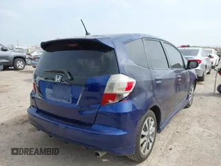 2013 Honda Fit Sport with VIN JHMGE8H54DC027896, listed as a IAAI auction lot 41933061 with 137,696 mi miles. Bid and sale history available at carsss.com. Image 4.