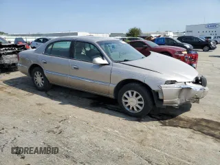 2002 Lincoln Continental with VIN 1LNHM97V22Y699435, listed as a Copart auction lot 66672354 with 216,764 mi miles and Salvage Title. Bid and sale history available at carsss.com. Image 4.