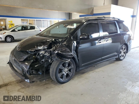 2014 Toyota Sienna SE with VIN 5TDXK3DC5ES418508, listed as a Copart auction lot 69742974 with 210,168 mi miles and Salvage Title. Bid and sale history available at DreamBid. Image 1.
