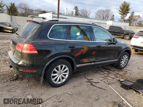 2012 Volkswagen Touareg Sport z VIN WVGEF9BP7CD006020, wystawiony jako Copart lot #88211145 z przebiegiem 180 729 mil mil oraz Szkoda całkowita • Salvage title. Historia ofert i sprzedaży dostępna na DreamBid. Obrazek 3.