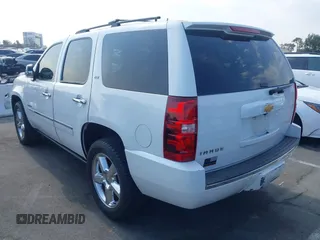 2013 Chevrolet Tahoe LTZ with VIN 1GNSKCE04DR374682, listed as a IAAI auction lot 42779526 with 139,533 mi miles and . Bid and sale history available at DreamBid. Image 3.