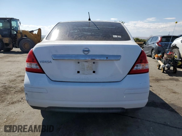 2009 Nissan Versa 1.8 S with VIN 3N1BC11E49L371066, listed as a Copart auction lot 57502474 with 157,127 mi miles and Salvage Title. Bid and sale history available at carsss.com. Image 6.