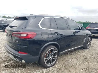 2020 BMW X5 sDrive40i with VIN 5UXCR4C0XLLW63728, listed as a Copart auction lot 56112475 with 65,704 mi miles and Clean title. Bid and sale history available at DreamBid. Image 3.
