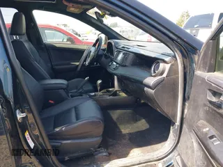 2018 Toyota RAV4 Hybrid SE with VIN JTMJJREV9JD191552, listed as a IAAI auction lot 42158665 with 84,025 mi miles and . Bid and sale history available at DreamBid. Image 5.