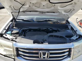 2013 Honda Pilot Touring with VIN 5FNYF4H95DB016049, listed as a Copart auction lot 61012725 with 104,252 mi miles and Salvage title. Bid and sale history available at DreamBid. Image 12.