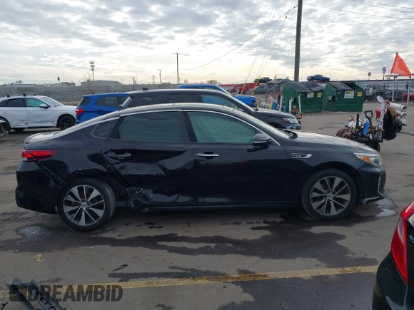 2016 Kia Optima SX Turbo with VIN 5XXGW4L2XGG052746, listed as a IAAI auction lot 41306792 with 69,571 mi miles and . Bid and sale history available at carsss.com. Image 13.