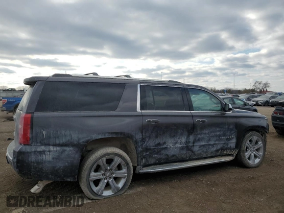2017 Chevrolet Suburban Premier z VIN 1GNSKJKCXHR403076, wystawiony jako Copart lot #46606025 z przebiegiem 99 481 mil mil oraz Szkoda całkowita • Salvage title. Historia ofert i sprzedaży dostępna na DreamBid. Obrazek 3.