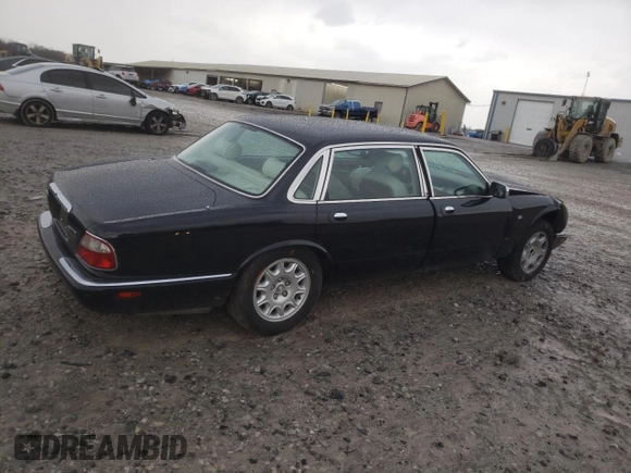 2003 Jaguar XJ Vanden Plas with VIN SAJDA24C33LF52131, listed as a Copart auction lot 84263554 with Not provided miles and Clean title. Bid and sale history available at DreamBid. Image 3.