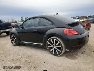 2012 Volkswagen Beetle 2.0T Turbo w/Sun/Sound with VIN 3VWV67ATXCM645050, listed as a Copart auction lot 45746555 with 152,935 mi miles and Salvage Title. Bid and sale history available at carsss.com. Image 2.