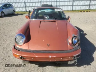 1974 Porsche 911 with VIN 9114111882, listed as a Copart auction lot 47080465 with 4,828 mi miles and Salvage title. Bid and sale history available at DreamBid. Image 5.