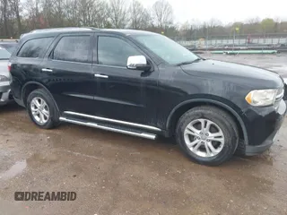 2013 Dodge Durango Crew with VIN 1C4RDHDG5DC613835, listed as a IAAI auction lot 41910643 with 155,827 mi miles. Bid and sale history available at carsss.com. Image 1.