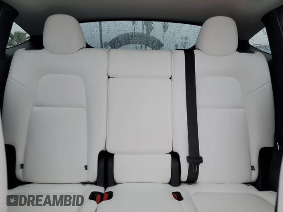 2025 Tesla Model Y Long Range with VIN 7SAYGAEE3SF216635, listed as a Copart auction lot 44614555 with 400 mi miles and Salvage Title. Bid and sale history available at DreamBid. Image 10.