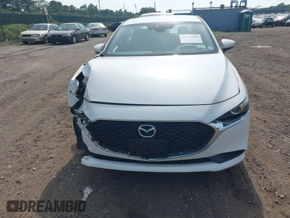 2019 Mazda 3 with VIN 3MZBPABL7KM114298, listed as a IAAI auction lot 42536800 with 53,598 mi miles and . Bid and sale history available at DreamBid. Image 12.