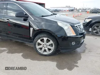 2013 Cadillac SRX Performance Collection with VIN 3GYFNHE34DS595277, listed as a IAAI auction lot 41618126 with 118,141 mi miles. Bid and sale history available at carsss.com. Image 6.