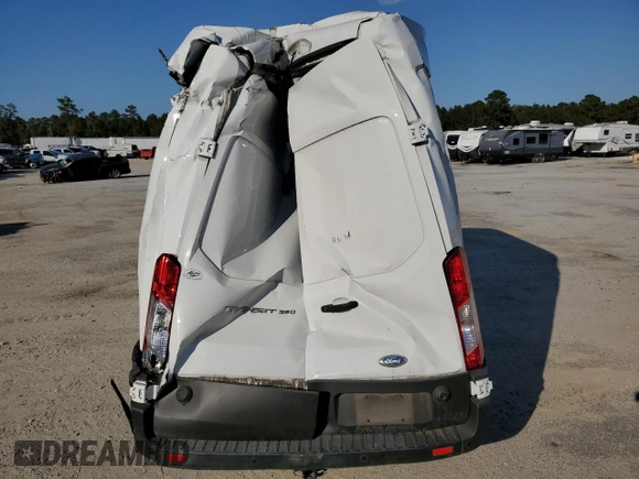 2021 Ford Transit Cargo with VIN 1FTBW3X83MKA40734, listed as a Copart auction lot 77427214 with Not Provided miles and Salvage Title. Bid and sale history available at carsss.com. Image 10.