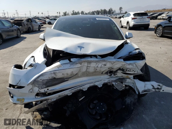2021 Tesla Model 3 Performance z VIN 5YJ3E1EC1MF075451, wystawiony jako Copart lot #60354235 z przebiegiem 52 662 mil mil oraz Szkoda całkowita • Salvage title. Historia ofert i sprzedaży dostępna na DreamBid. Obrazek 5.