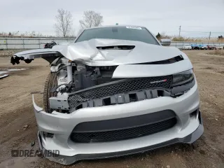 2021 Dodge Charger R/T with VIN 2C3CDXCT7MH594513, listed as a Copart auction lot 52482085 with 62,694 mi miles and Salvage Title. Bid and sale history available at carsss.com. Image 5.