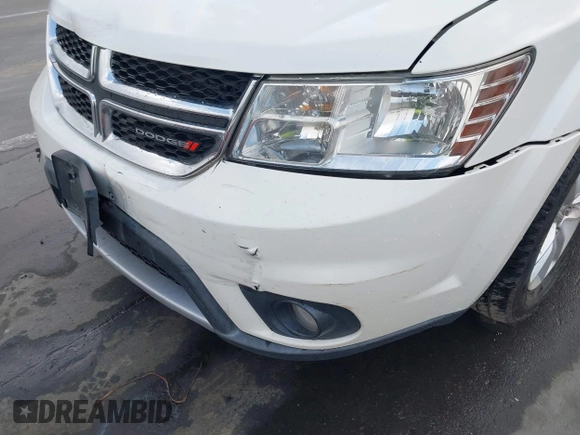 2015 Dodge Journey SXT with VIN 3C4PDDBG9FT600712, listed as a IAAI auction lot 42090741 with 111,741 mi miles and . Bid and sale history available at DreamBid. Image 6.