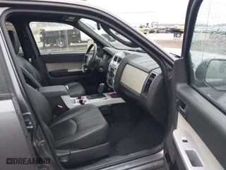 2009 Mercury Mariner Premier with VIN 4M2CU97G09KJ18960, listed as a IAAI auction lot 41842814 with 137,855 mi miles. Bid and sale history available at carsss.com. Image 5.