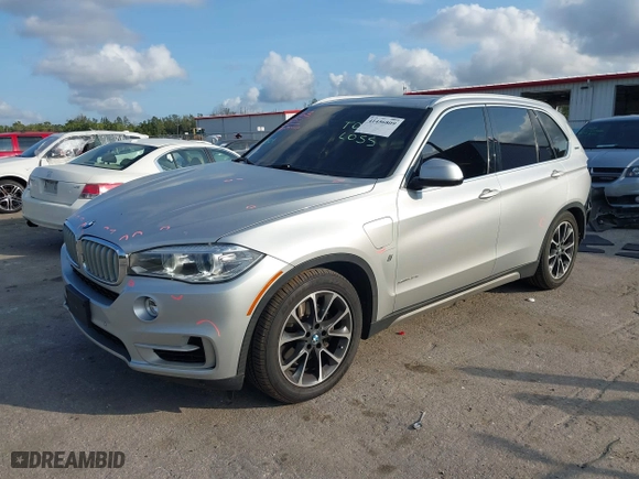 2018 BMW X5 xDrive40e iPerformance with VIN 5UXKT0C53J0V98060, listed as a IAAI auction lot 41456809 with 75,407 mi miles. Bid and sale history available at carsss.com. Image 18.