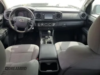 2019 Toyota Tacoma SR with VIN 5TFSX5EN7KX068425, listed as a Copart auction lot 57580835 with 125,491 mi miles and Salvage title. Bid and sale history available at DreamBid. Image 8.