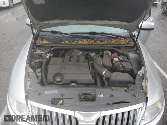 2012 Lincoln MKS with VIN 1LNHL9DR5CG804793, listed as a Copart auction lot 48966795 with 111,097 mi miles and Clean Title. Bid and sale history available at DreamBid. Image 11.