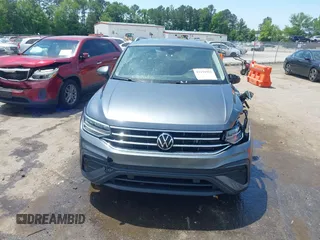 2023 Volkswagen Tiguan SE with VIN 3VV3B7AX3PM118743, listed as a IAAI auction lot 42291956 with 32,776 mi miles and . Bid and sale history available at DreamBid. Image 12.