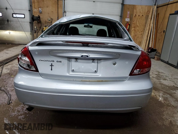 2004 Ford Taurus SE with VIN 1FAFP53224G175353, listed as a Copart auction lot 52713935 with 213,375 mi miles and Salvage Title. Bid and sale history available at DreamBid. Image 6.