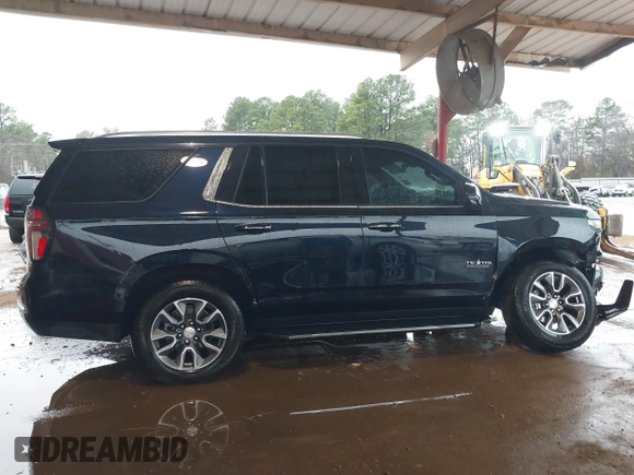 2023 Chevrolet Tahoe LT with VIN 1GNSKNKD8PR557980, listed as a IAAI auction lot 41562421 with 29,586 mi miles and . Bid and sale history available at DreamBid. Image 12.