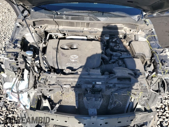 2017 Mazda CX-5 Touring with VIN JM3KFBCL2H0204097, listed as a Copart auction lot 88173195 with 76,884 mi miles and Salvage Title. Bid and sale history available at carsss.com. Image 12.