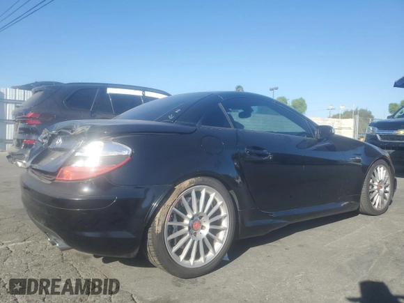 2006 Mercedes-Benz SLK-Class 5.5L AMG with VIN WDBWK73F16F093516, listed as a Copart auction lot 77485754 with 112,419 mi miles and Salvage Title. Bid and sale history available at carsss.com. Image 3.